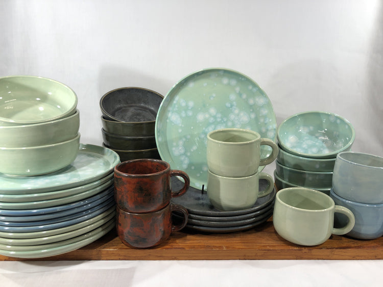 A collection of some of the dinner we make; plates, bowls and mugs.